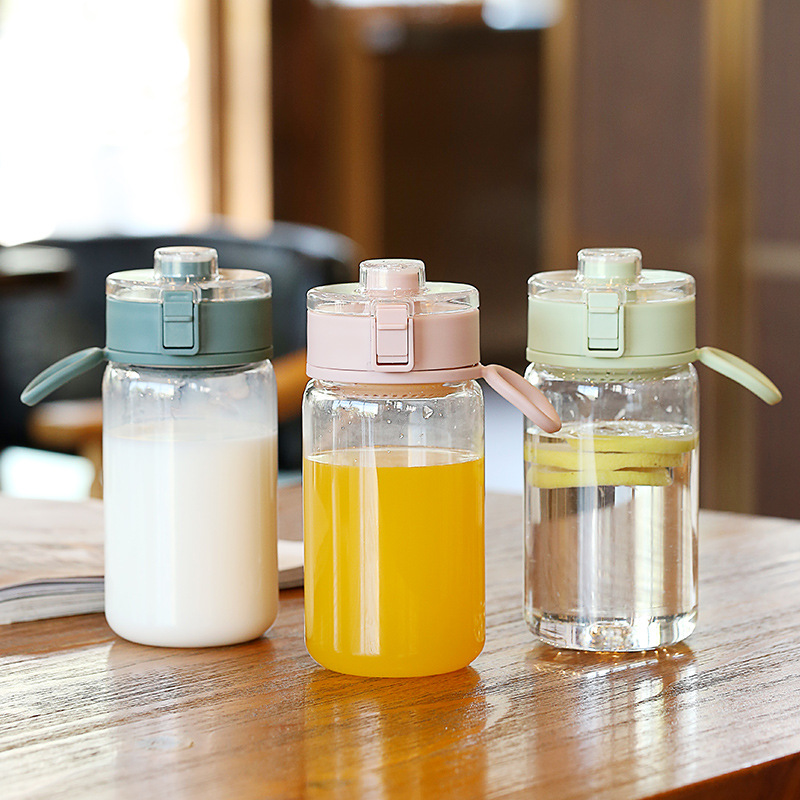 學(xué)生小容量運(yùn)動(dòng)時(shí)尚水杯便攜彈蓋帶提手塑料隨身杯禮品批發(fā)印LOGO